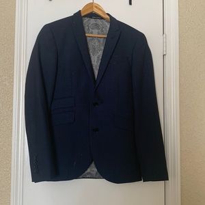 Small navy blue suit jacket